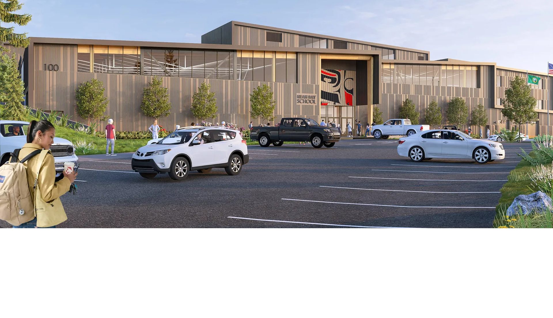 Front view of relocated campus from parkling lot with cards